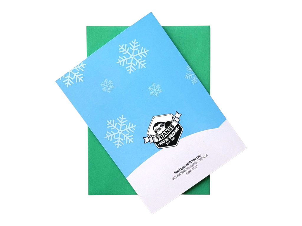 Blue card with snowflake patterns on a green card, featuring a logo and text.