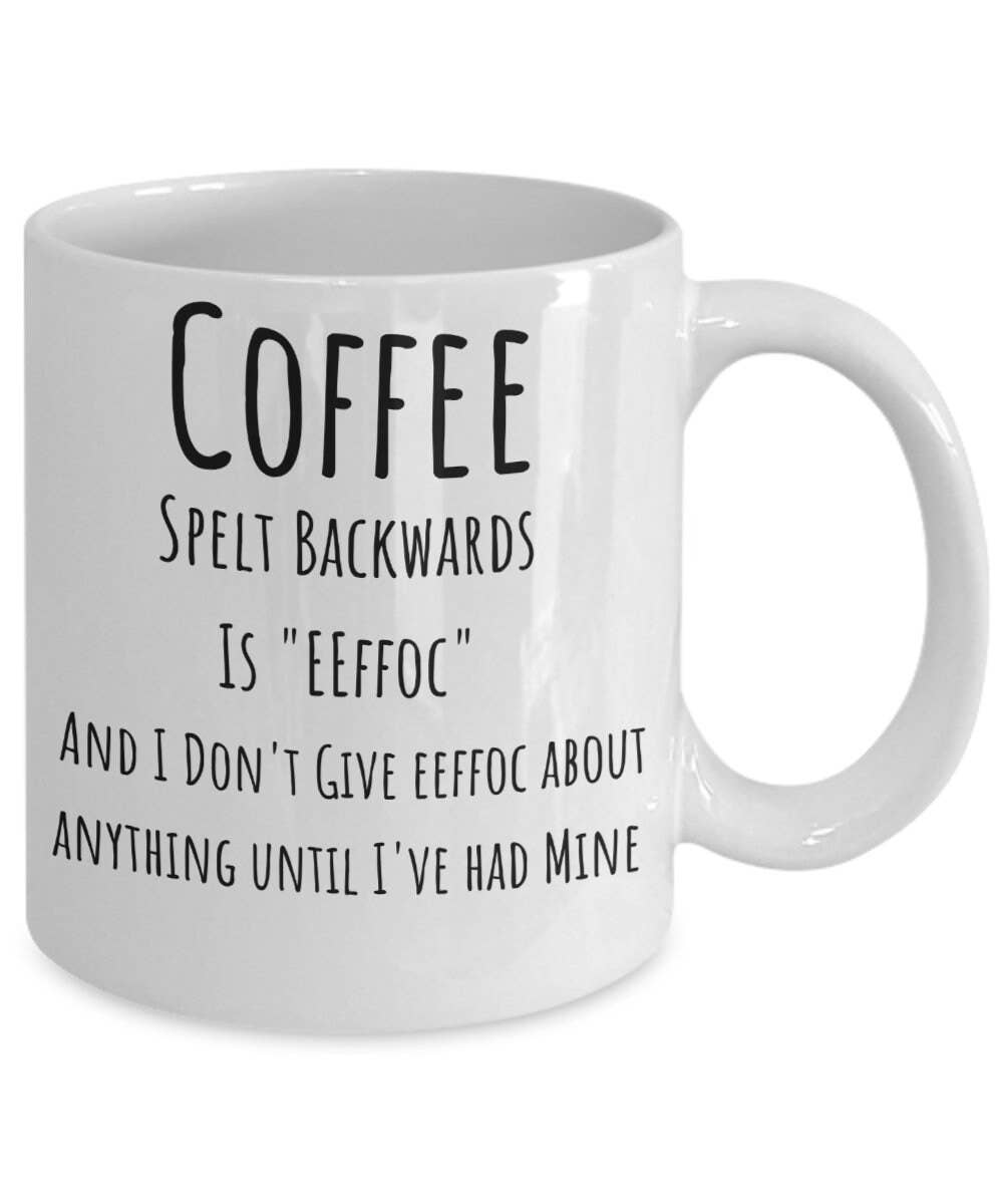 White mug with humorous text design on a white background