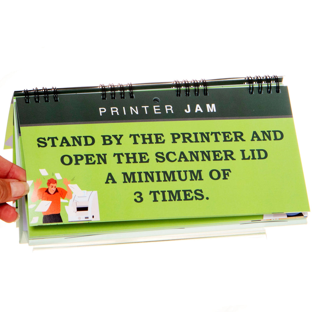 Calendar with humorous printer jam instructions held by a hand