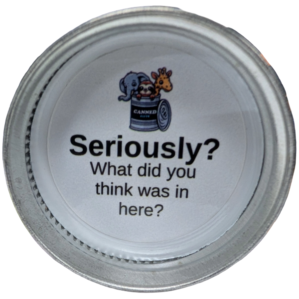 Metal can lid with humorous text and cartoon characters on a white background
