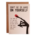 Card with humorous message and hand illustration on a beige background