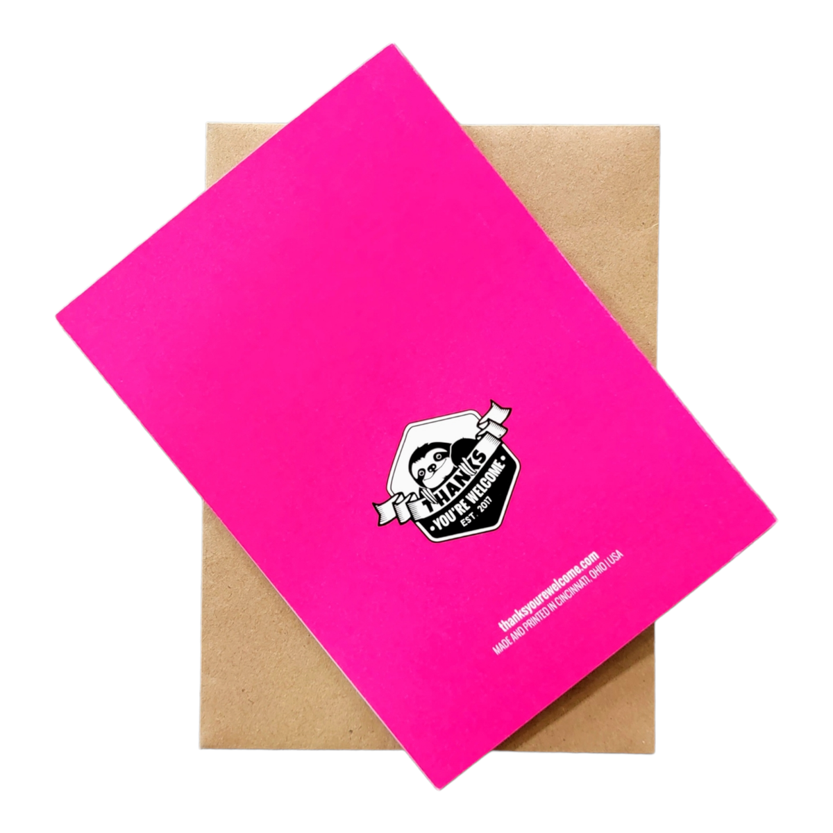 Pink card with a logo and text on a brown envelope