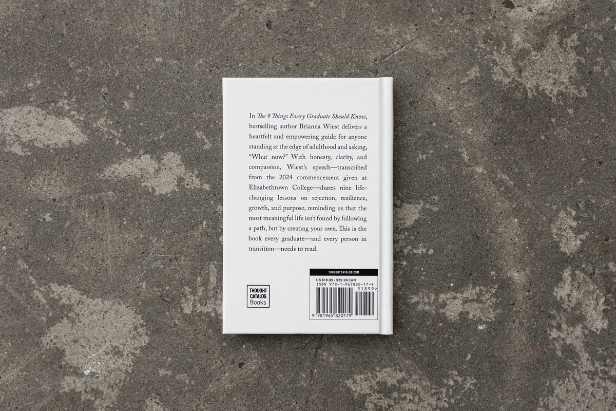 Book back cover on a textured stone surface