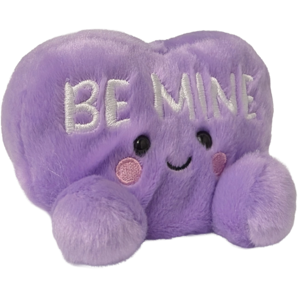 Purple plush heart with 'BE MINE' text on a white background