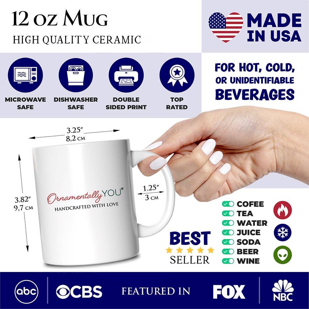 12 oz mug with measurement details and safety features, held by a hand.