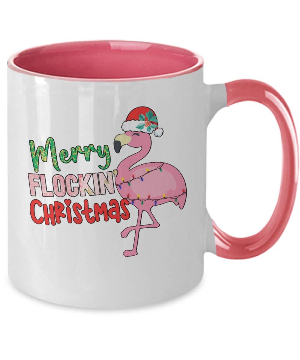 Mug with a pink flamingo design and 'Merry Flocking Christmas' text on a white background