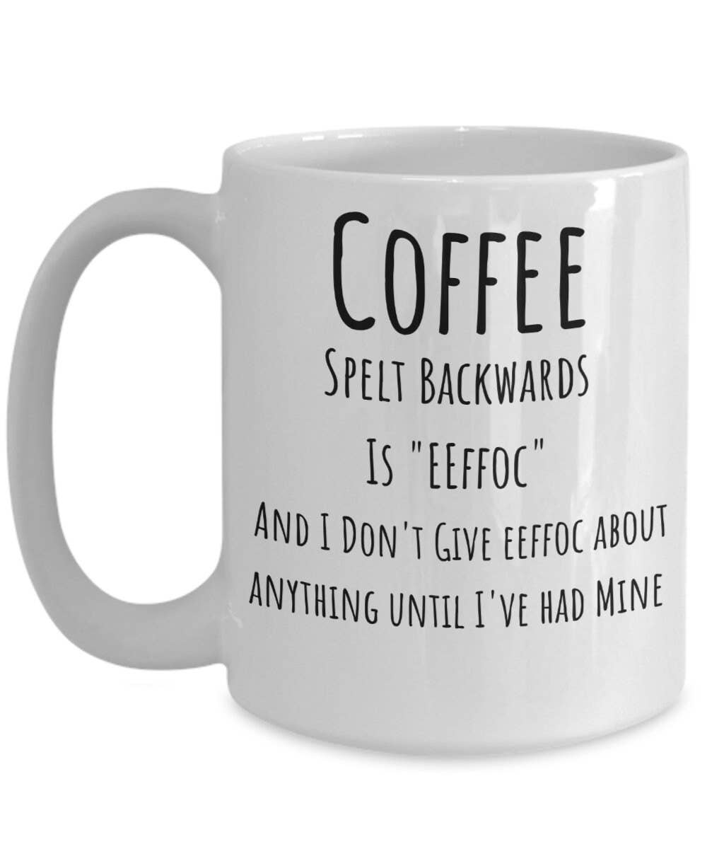 White mug with humorous text about coffee on a white background