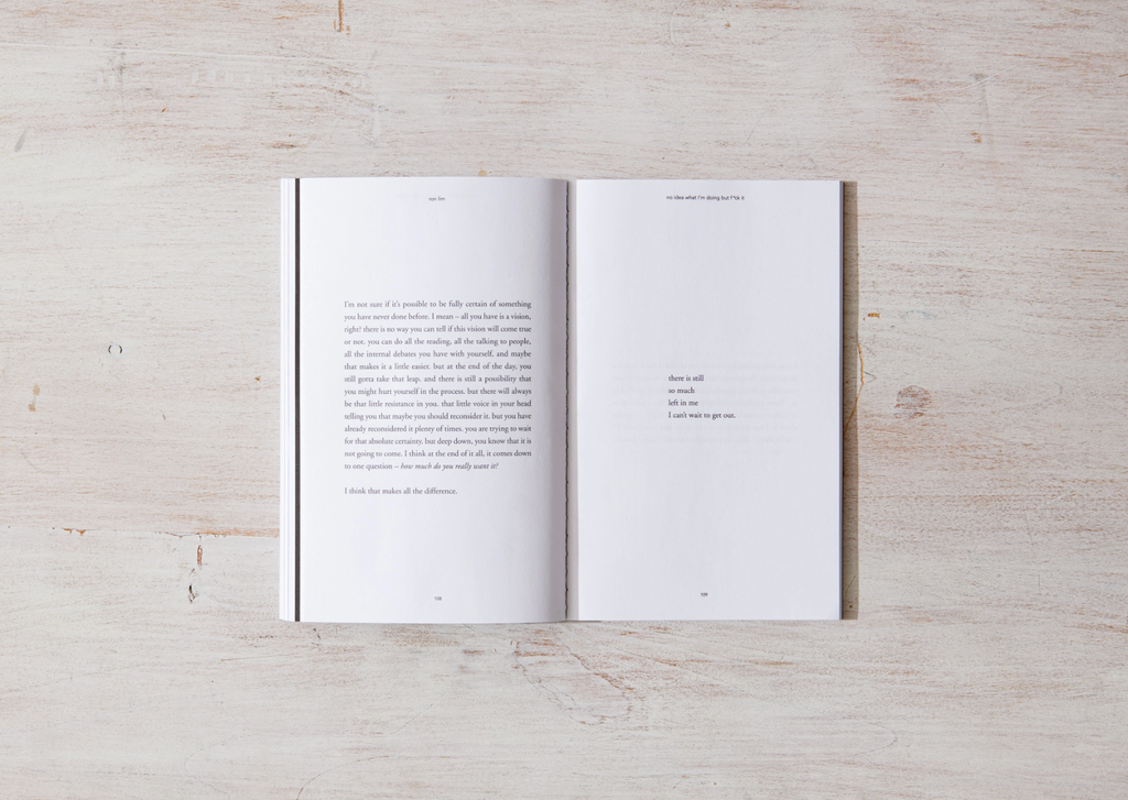 Open book on a wooden surface with text visible