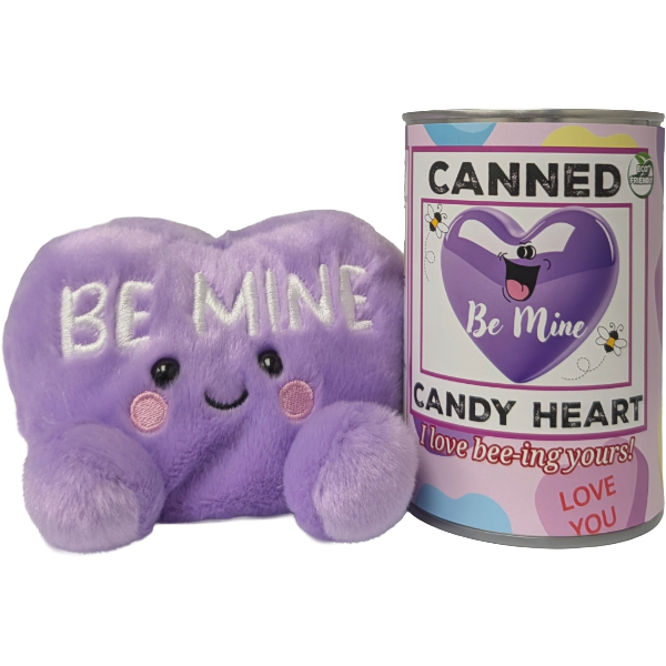 Purple plush heart with 'Be Mine' text next to a can labeled 'Canned Candy Heart'.